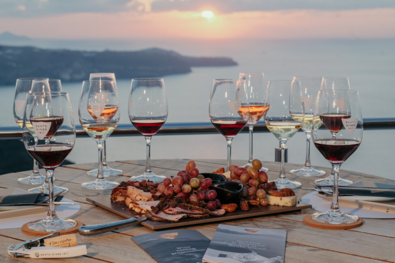 Santorini sunset wine tasting at Santo Wines with caldera and Aegean views