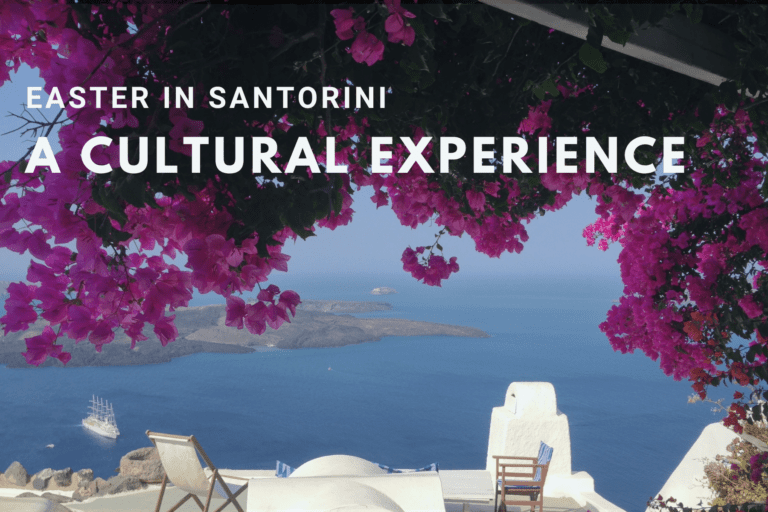 Vibrant pink bougainvillea flowers frame a stunning view of the Aegean Sea and Santorini's caldera from a whitewashed patio. A sailboat is visible on the horizon.