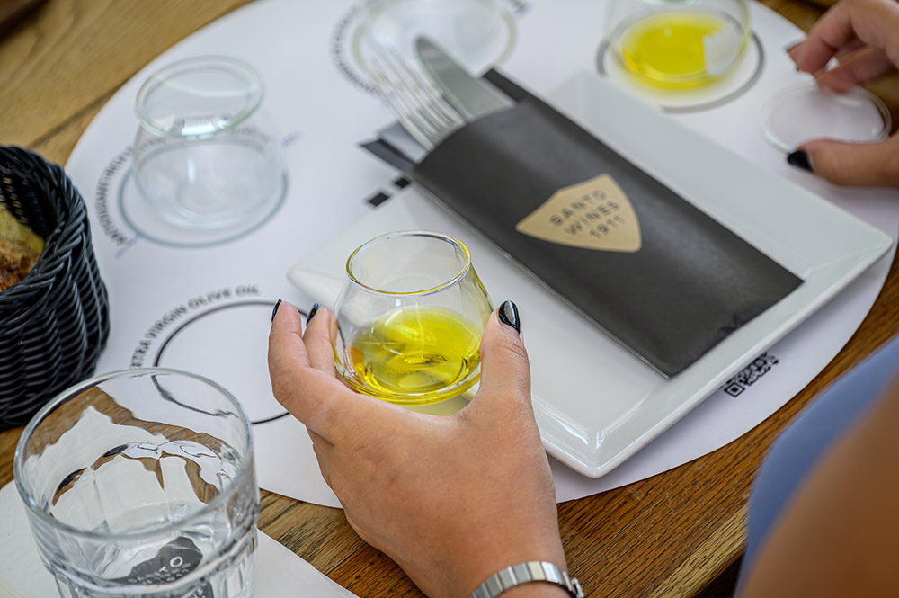 Olive oil tasting at Santo Wines during a Santorini wine and olive oil tour with two wineries Olive oil tasting experience at Santo Wines on a Santorini wine and olive oil tour with two wineries